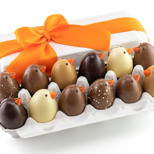 Twelve chicks in a box